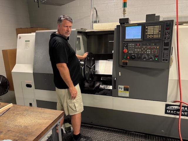 Large CNC Lathe at Forward Motion Technologies manufacturing facility - Premium wheel production equipment