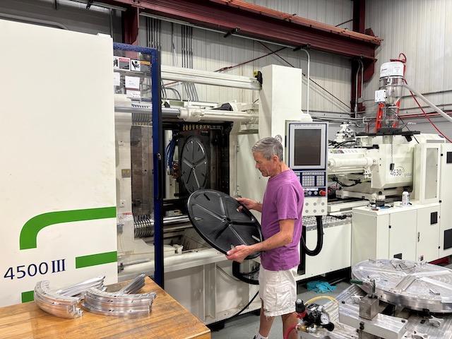 506 U.S.Ton Injection Molding Machine at Forward Motion Technologies manufacturing facility - Premium wheel production equipment